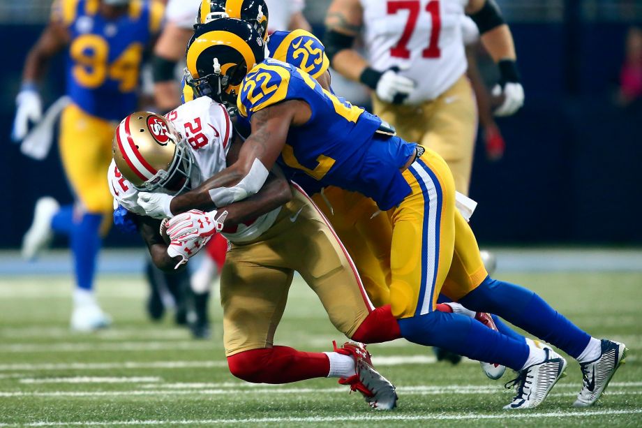 ST. LOUIS, MO - NOVEMBER 1: Trumaine Johnson #22 of the St. Louis Rams tackles Torrey Smith #82 of the San Francisco 49ers in the first quarter at the Edward Jones Dome on November 1, 2015 in St. Louis, Missouri. (Photo by Dilip Vishwanat/Getty Images)